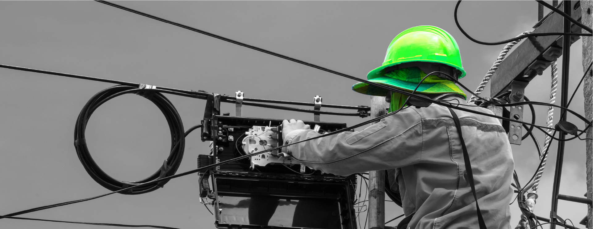 Electrician working on power lines
