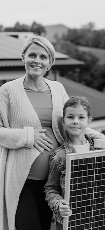 Family happy with solar panels