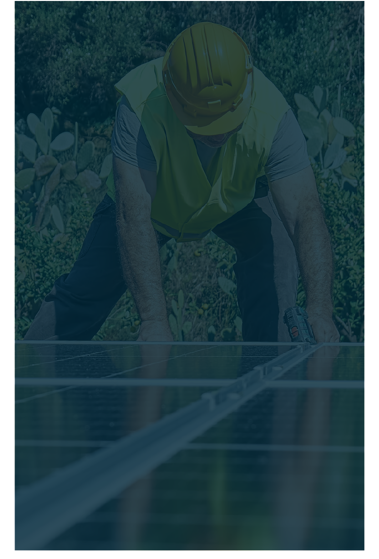 Worker installing a solar panel