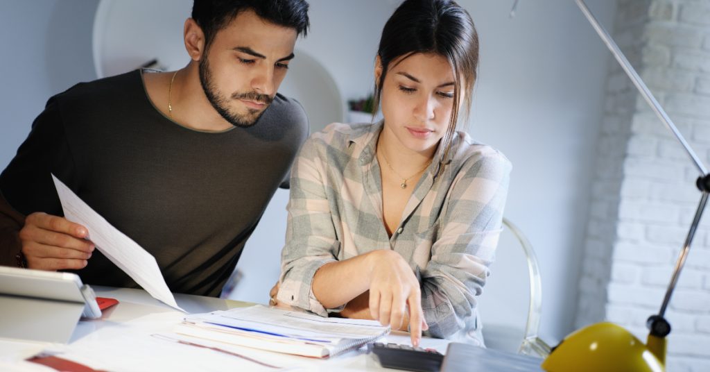 young couple comparing solar quotes