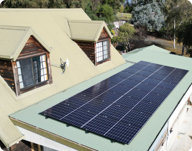 Launceston house with solar panels on green roof