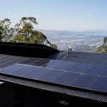 Solar panels on black roof in Hobart