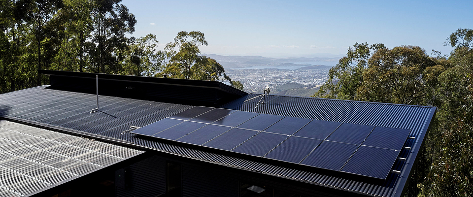 Solar panels on black roof in Hobart